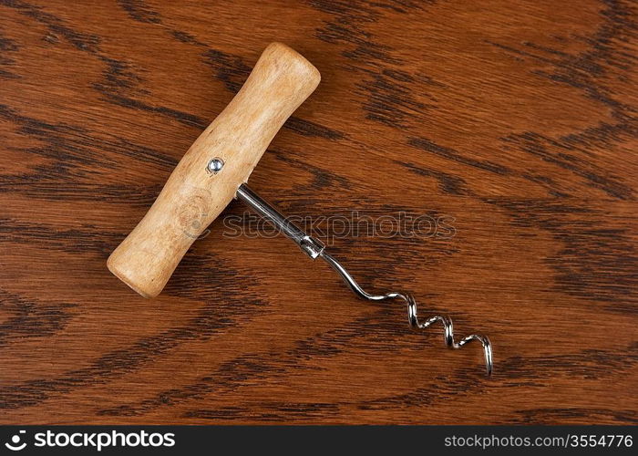 corkscrew on a wooden background