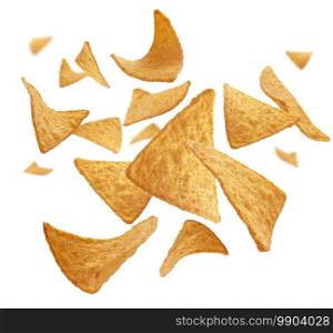 Corn chips of triangular shape levitate on a white background.. Corn chips of triangular shape levitate on a white background