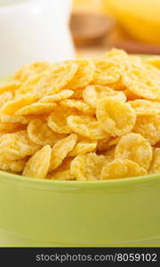 corn flakes in bowl at napkin