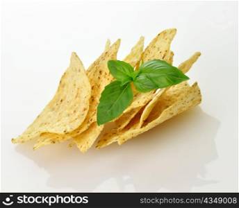 Corn tortilla chips on white background , close up