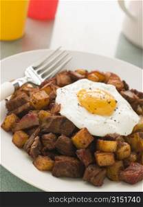 Corned Beef Hash With a Fried Egg and Black Pepper