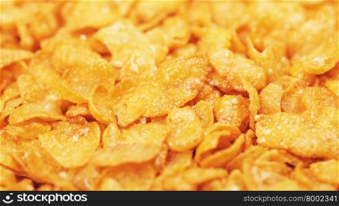 cornflakes with honey and nuts, closeup background