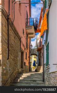 Corniglia, Colorful cityscape on the mountains over Mediterranean sea in Cinque Terre Italy Europe