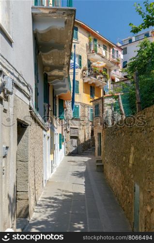 Corniglia. Old City Street.. Traditional narrow street in the famous medieval village of Corniglia. Cinque Terre. Italy.