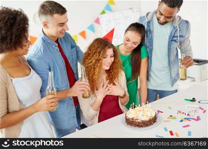corporate and people concept - happy team of coworkers with non-alcoholic drinks and cake celebrating birthday at office party. happy coworkers with cake at office birthday party