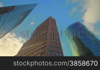 Corporate buildings on Potsdamer Platz in Berlin, time lapse, low angle view