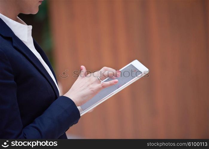 corporate business woman working on tablet computer at modern office interior
