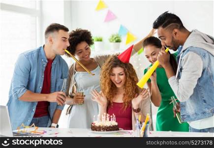 corporate, celebration and people concept - happy team with birthday cake and non-alcoholic drinks greeting colleague at office party. team greeting colleague at office birthday party