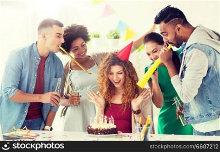 corporate, celebration and people concept - happy team with birthday cake and non-alcoholic drinks greeting colleague at office party. team greeting colleague at office birthday party