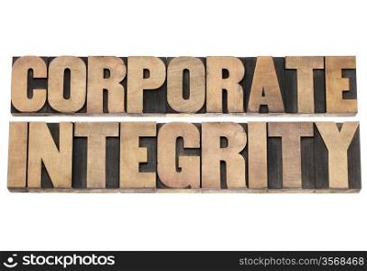 corporate integrity - business ethics concept - isolated text in vintage letterpress wood type printing blocks