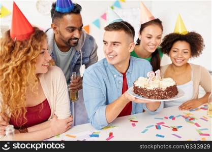 corporate party and people concept - happy team with cake and non-alcoholic drinks celebrating colleague 21st birthday at office. team greeting colleague at office birthday party