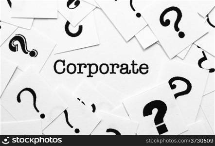 Corporate text and question mark
