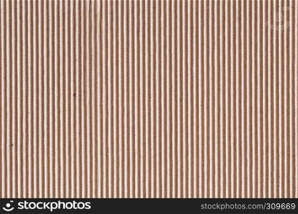 Corrugated cardboard or brown paper box sheet texture for background