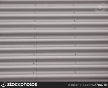 Corrugated steel. Corrugated steel plate useful as a background
