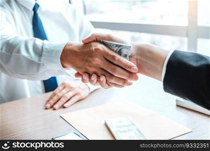 Corruption and Bribery ,Businessman shaking hands giving dollar bills corruption bribery to business manager to deal contract