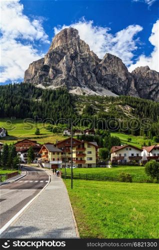 Corvara in Badia town and Sassongher mount on summer, south Tyrol, Italy
