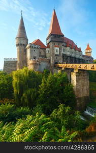 Corvin Castle summer morning view (Hunedoara, Transylvania, Romania). Was laid out in 1446