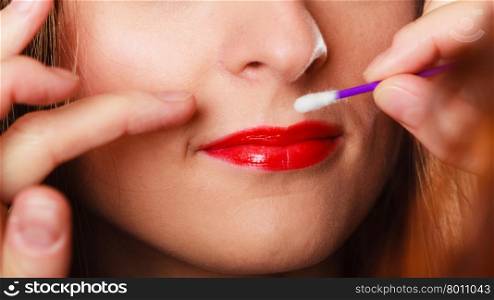 Cosmetic beauty procedures and makeover concept. Closeup part of woman face red lips. Make-up artist applying lipstick