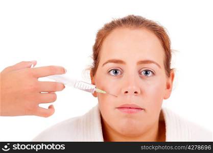 Cosmetic botox injection in a woman&acute;s face - Eyes Zone - Isolated on white