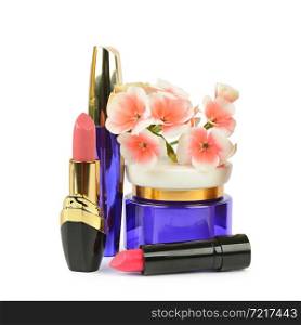 Cosmetic face cream, Mascara and lipstick isolated on white background.