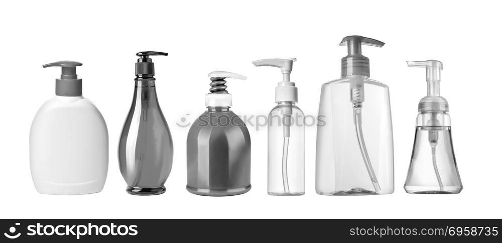 Cosmetic plastic bottle with dispenser pump isolated on white background. Cosmetic plastic bottle