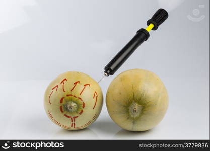 Cosmetic treatment for Female breasts metaphor: melons air pumped by bicycle pump meaning cosmetic and health treatment