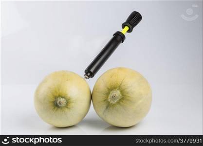 Cosmetic treatment for Female breasts metaphor: melons air pumped by bicycle pump meaning cosmetic and health treatment