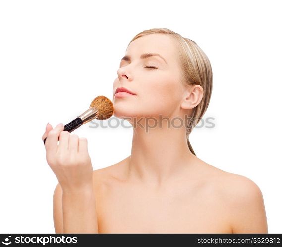 cosmetics, health and beauty concept - beautiful woman with closed eyes and makeup brush