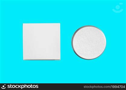 Cosmetics mockup template on blue toscha background. Plastic container for cosmetics products. Tube, cream pot, beauty products isolated on white background. 3D rendering.