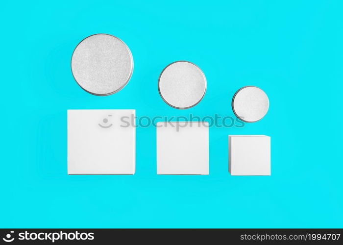 Cosmetics mockup template on blue toscha background. Plastic container for cosmetics products. Tube, cream pot, beauty products isolated on white background. 3D rendering.