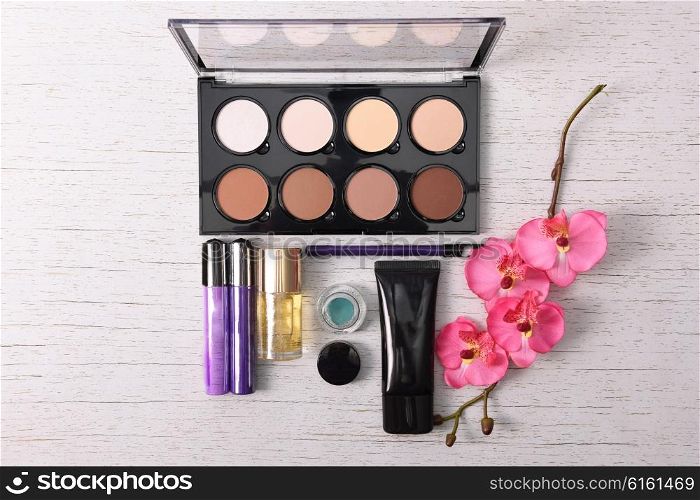 cosmetics set for make-up . cosmetics set for make-up on wood background
