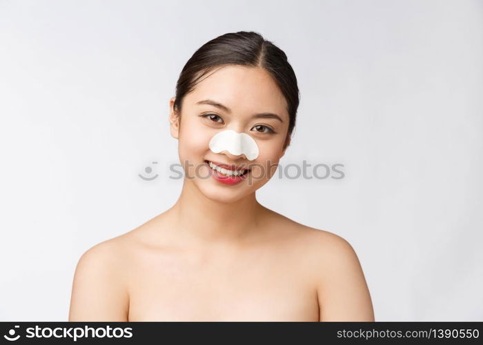 Cosmetology. Portrait Of Beautiful Female Asian Model With Mask On Nose. Closeup Of Healthy Young Woman With Pure Soft Skin And Fresh Natural Makeup. Cosmetology. Portrait Of Beautiful Female Asian Model With Mask On Nose. Closeup Of Healthy Young Woman With Pure Soft Skin And Fresh Natural Makeup.