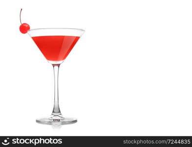 Cosmopolitan cocktail in classic crystal glass with pink cherry on white background. Space for text