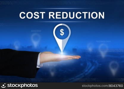 cost reduction button with business hand on blurred background