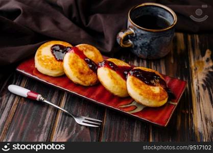 cottage cheese cakes with berry jam