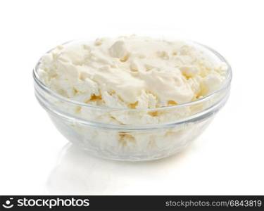 cottage cheese in bowl on white . cottage cheese in bowl on white background