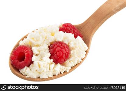 cottage cheese in spoon on white background