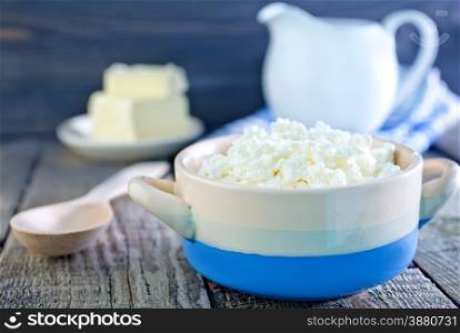 cottage cheese in the bowl and on a table