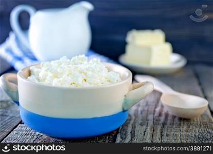 cottage cheese in the bowl and on a table