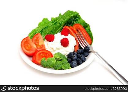 Cottage cheese salad with vegetables and berries including Raspberry, Blueberry, Red Bell Pepper, Broccoli, Tomato on a bed of Romain lettuce.. Berry And Cottage Cheese Salad