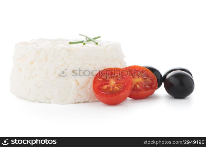 Cottage cheese with olives and tomatoes isolated on white background.