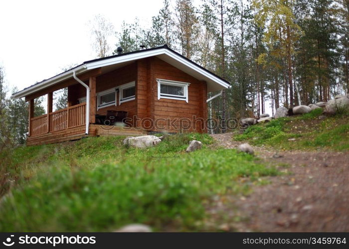 cottage in forest on hill