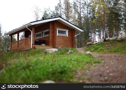 cottage in forest on hill