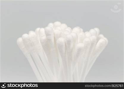 Cotton buds on the gray background.