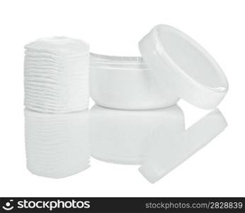 cotton pads and cream isolated with reflection