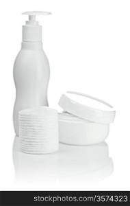 cotton pads bottle and cream isolated