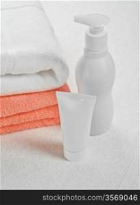 cotton towels tube and bottle