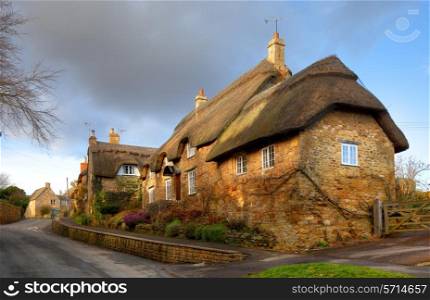 Cotwold thatched stone cottage, Ebrington, Gloucestershire, England.