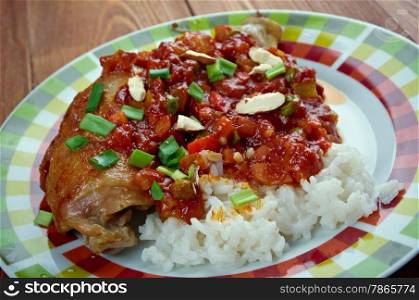 Country Captain - curried chicken and rice dish, popular in Southern United States.