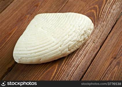 Country cheese on a wooden table